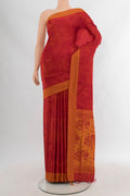 Red Soft Silk Saree with Jacquard design on the body and Thread Border.  displayed on a mannequin