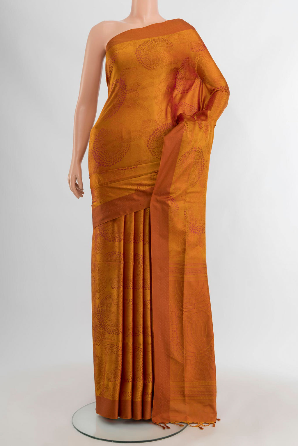 Mustard Soft Silk Saree with Jacquard design on the body and Thread Border.  displayed on a mannequin