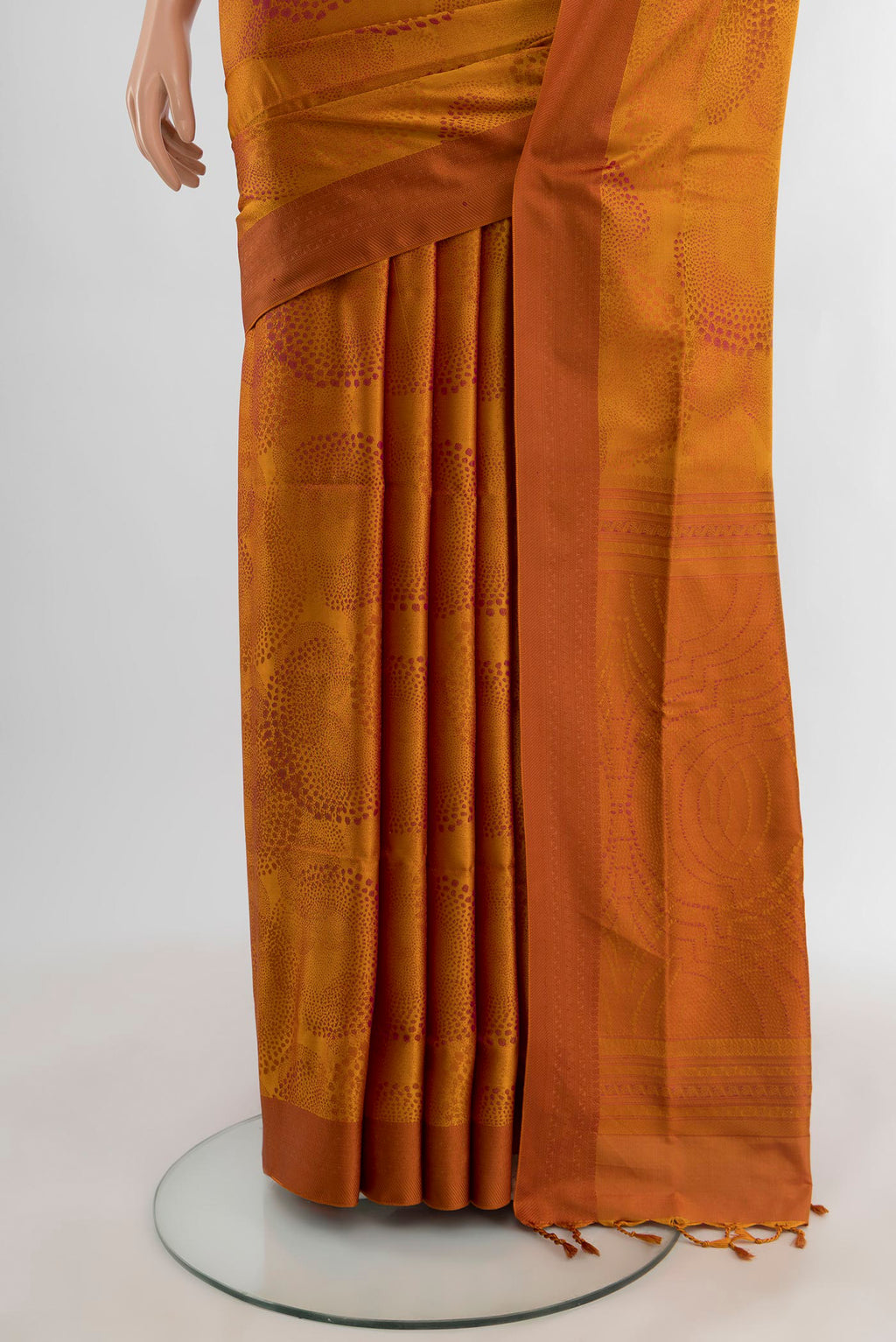 Pleats and pallu of Mustard Soft Silk Saree with Jacquard design on the body and Thread Border. 