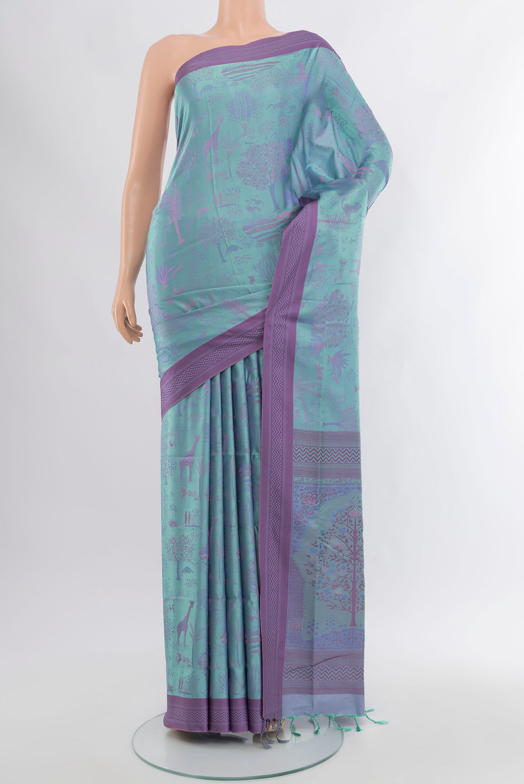 Light Blue Soft Silk Saree with Jacquard design on the body and Thread Border.  displayed on a mannequin