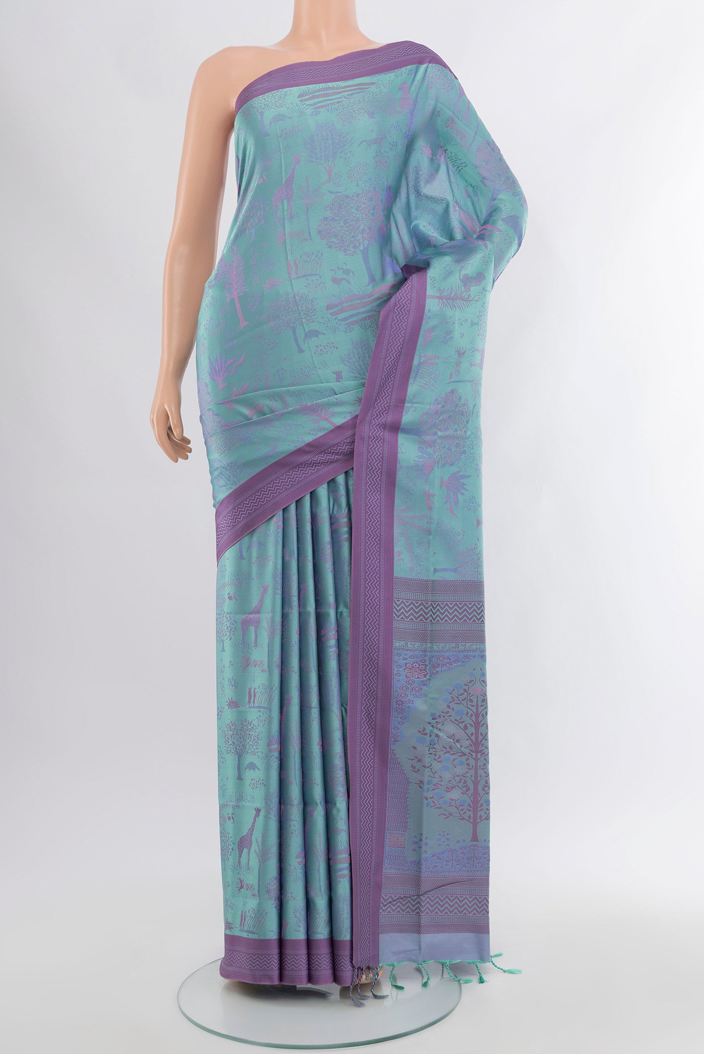 Light Blue Soft Silk Saree with Jacquard design on the body and Thread Border.  displayed on a mannequin