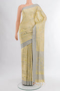 Lemon Yellow Soft Silk Saree with Jacquard design on the body and Thread Border.  displayed on a mannequin