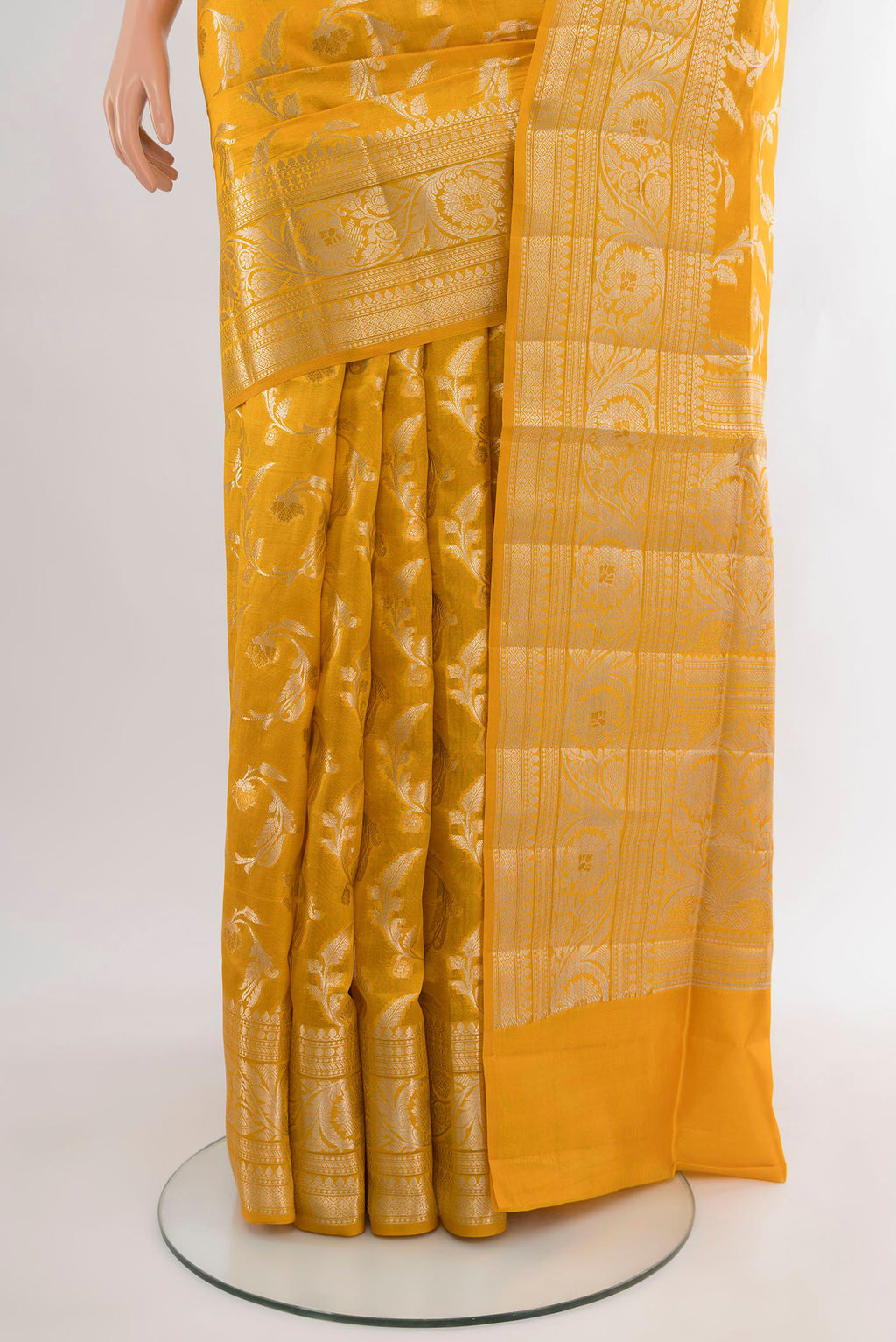 Pleats and pallu of Yellow Banarasi Raw Silk Saree with Zari Butta on the body and Zari Border. 
