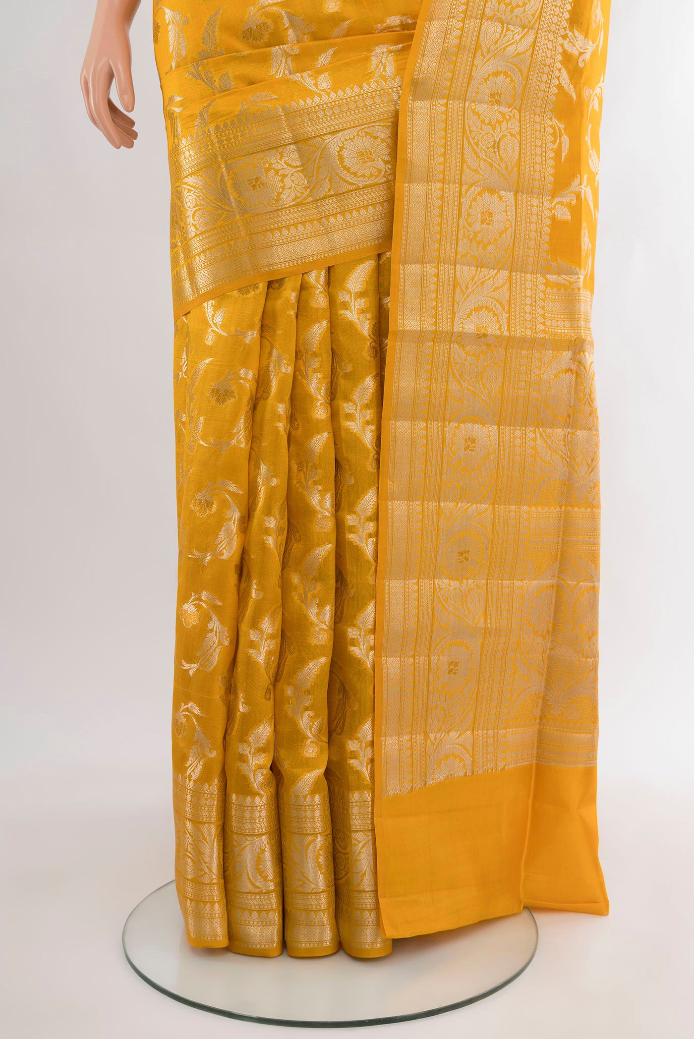 Pleats and pallu of Yellow Banarasi Raw Silk Saree with Zari Butta on the body and Zari Border. 