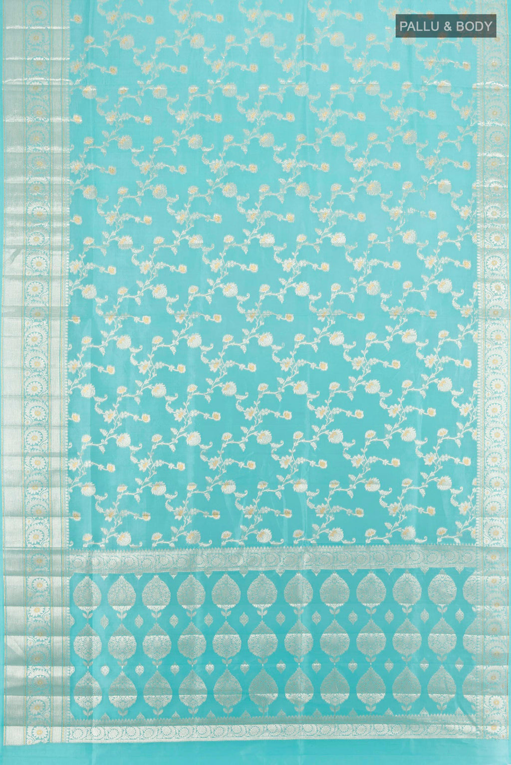 Flat view of Sky Blue Banarasi Raw Silk Saree with Zari Butta on the body and Zari Border. 