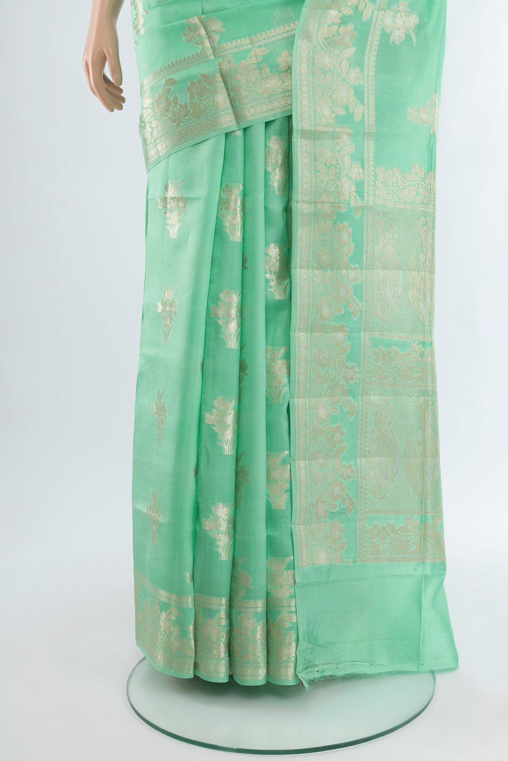 Pleats and pallu of Sea Green Banarasi Raw Silk Saree with Zari Butta on the body and Zari Border. 