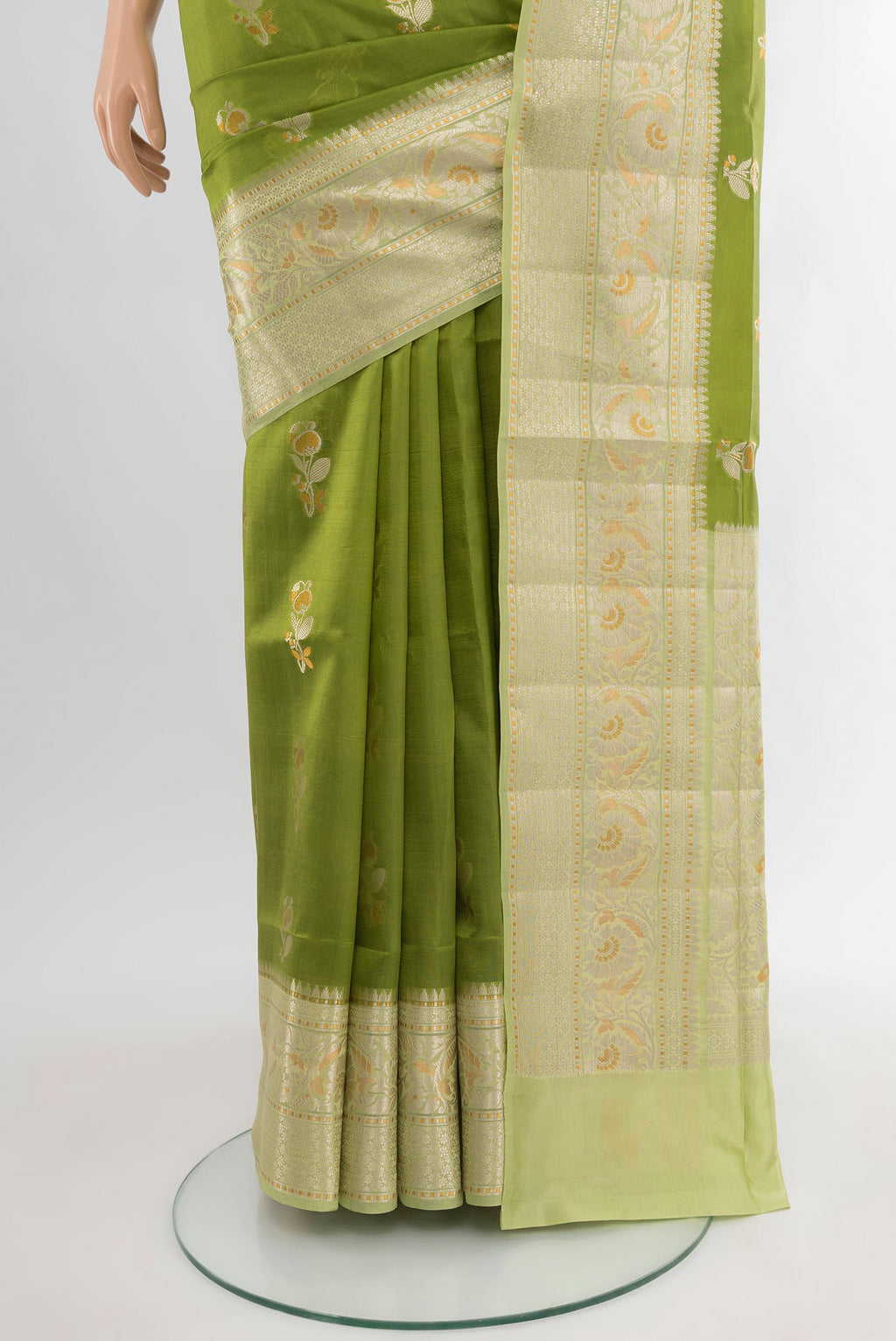 Pleats and pallu of Green Banarasi Katan Silk Saree with Zari Butta on the body and Zari Border. 