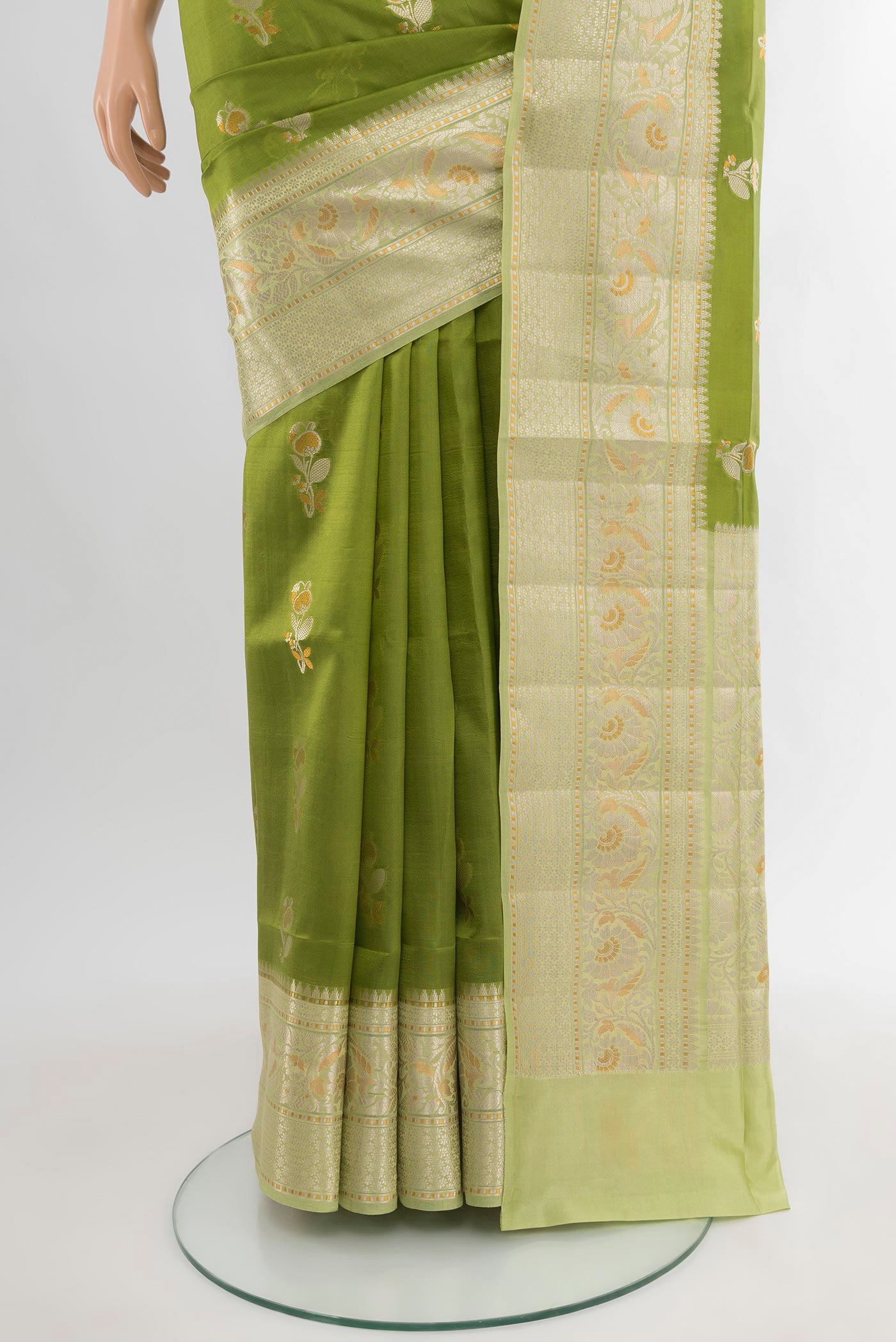 Pleats and pallu of Green Banarasi Katan Silk Saree with Zari Butta on the body and Zari Border. 