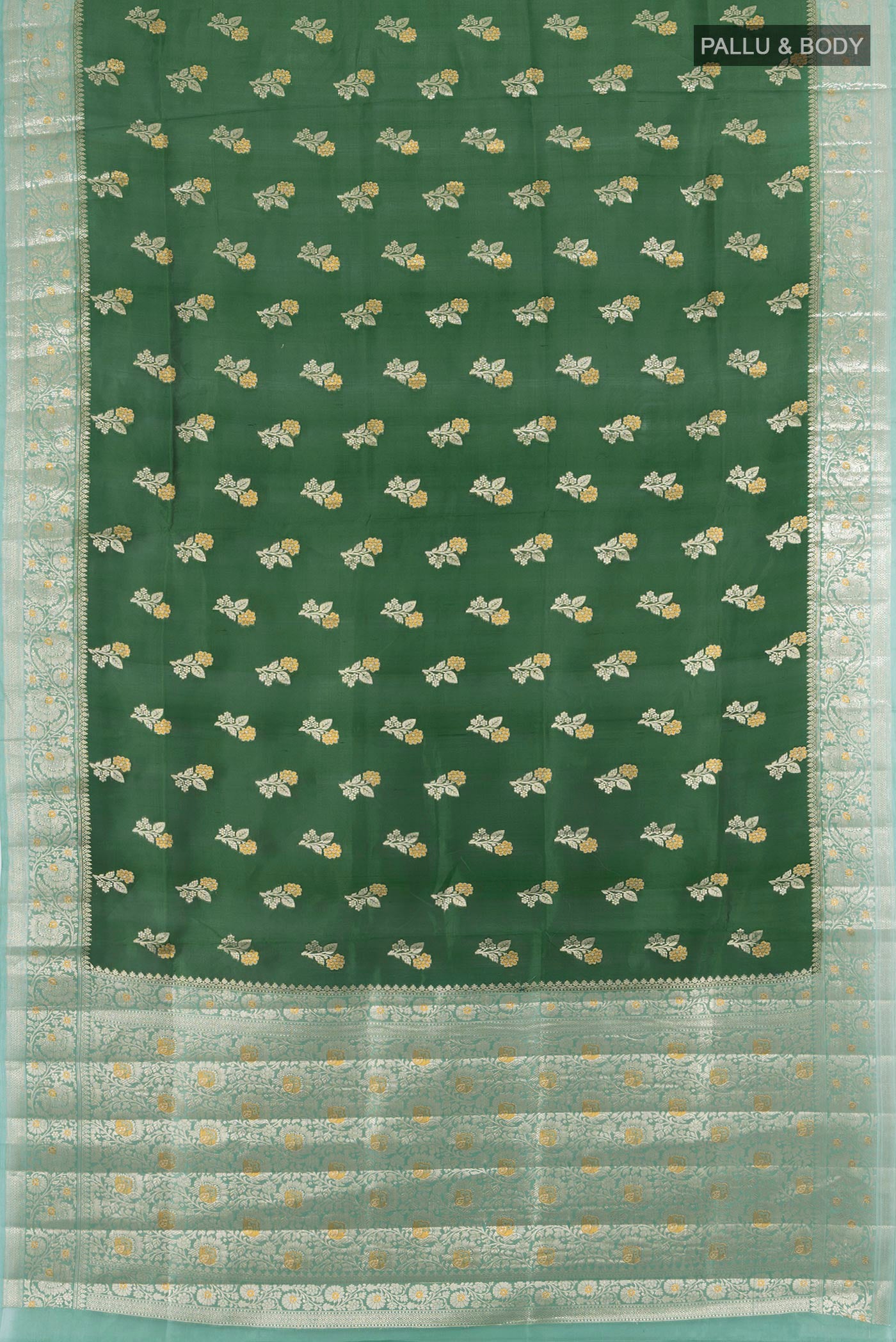 Flat view of Bottle Green Banarasi Raw Silk Saree with Zari Butta on the body and Zari Border. 