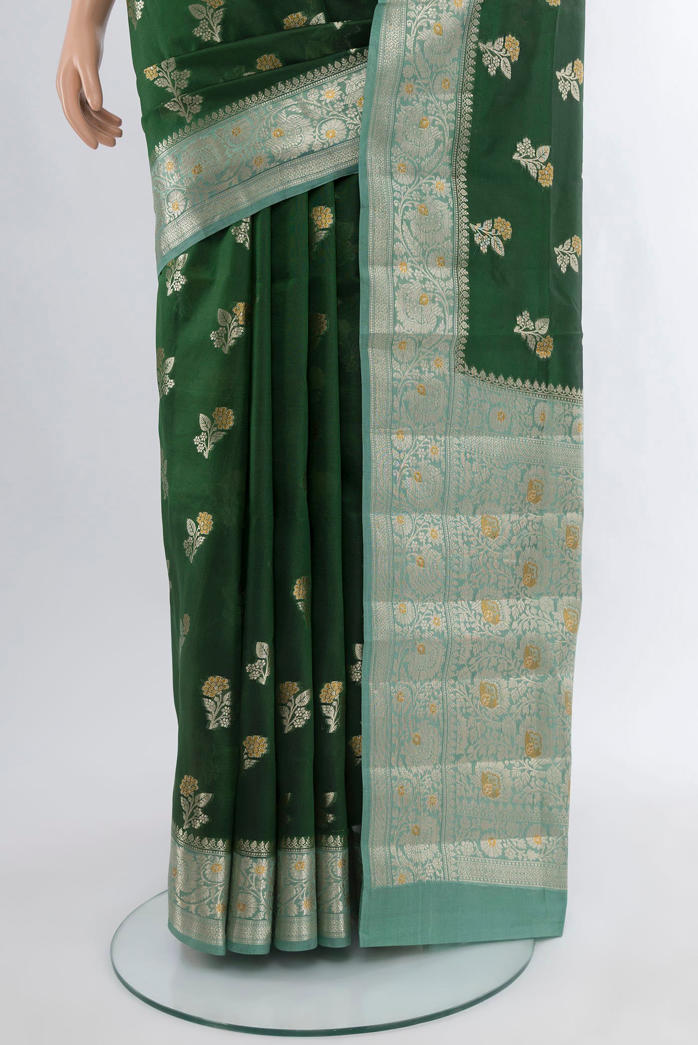 Pleats and pallu of Bottle Green Banarasi Raw Silk Saree with Zari Butta on the body and Zari Border. 