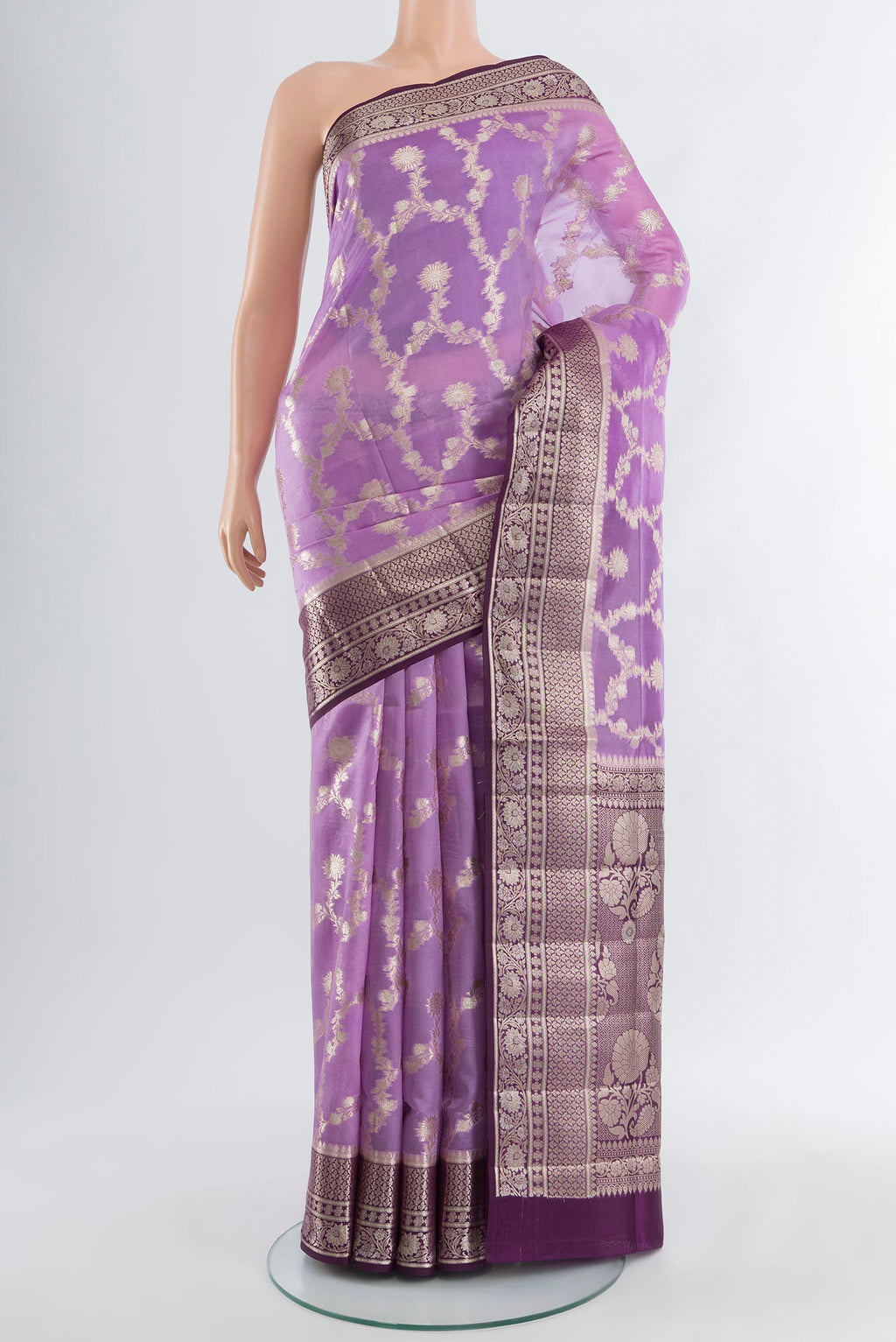 Lavender Banarasi Raw Silk Saree with Zari Butta on the body and Zari Border.  displayed on a mannequin