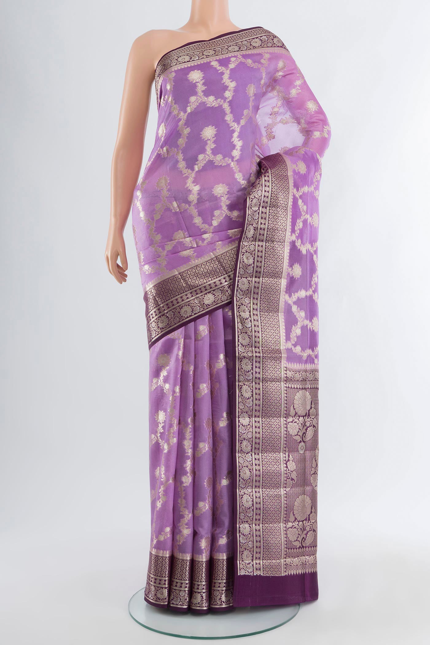 Lavender Banarasi Raw Silk Saree with Zari Butta on the body and Zari Border.  displayed on a mannequin