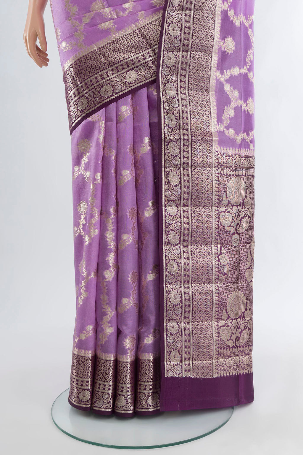 Pleats and pallu of Lavender Banarasi Raw Silk Saree with Zari Butta on the body and Zari Border. 