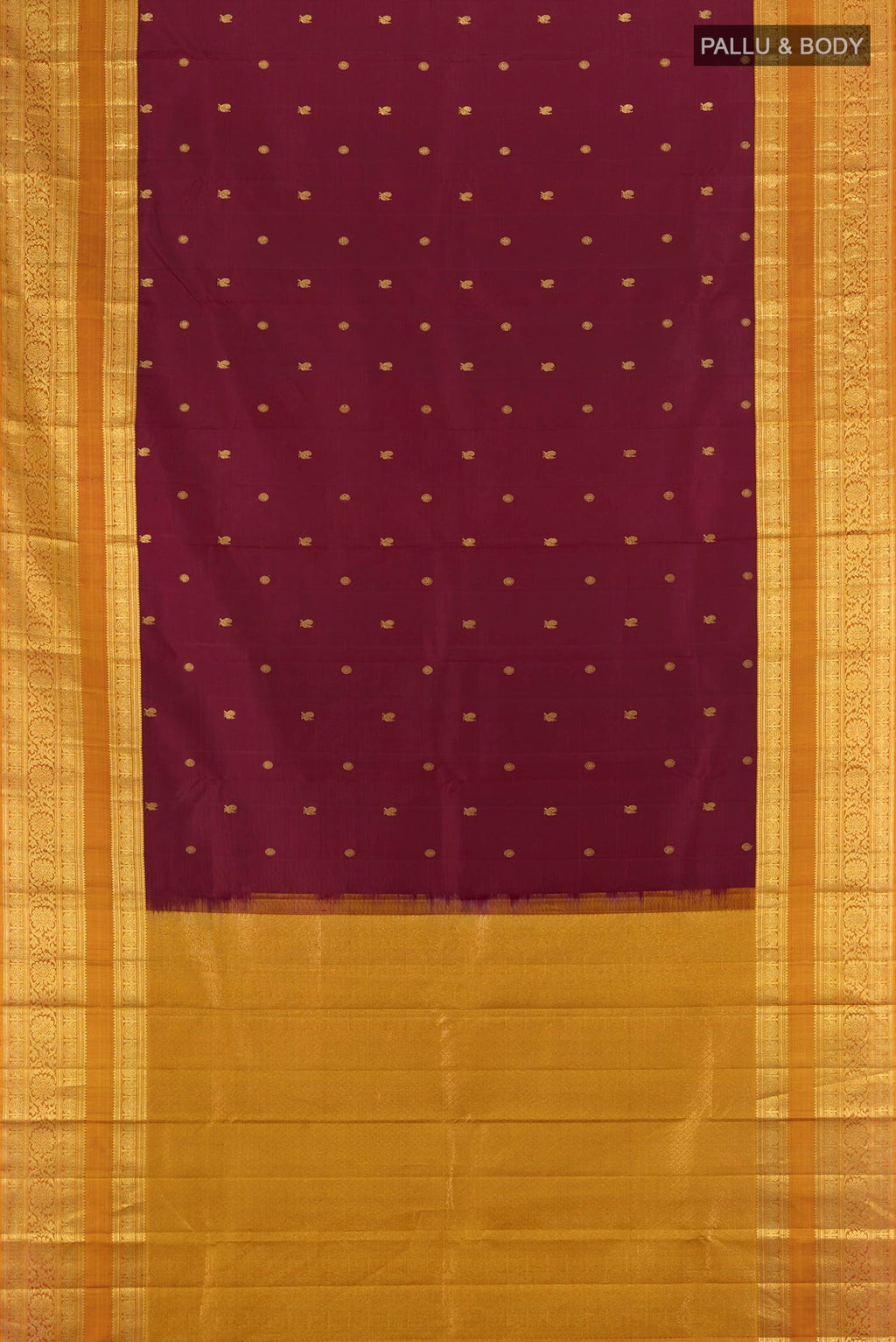 Flat view of Maroon Kanchipuram Silk Saree with Zari Butta on the body and Zari Border. 