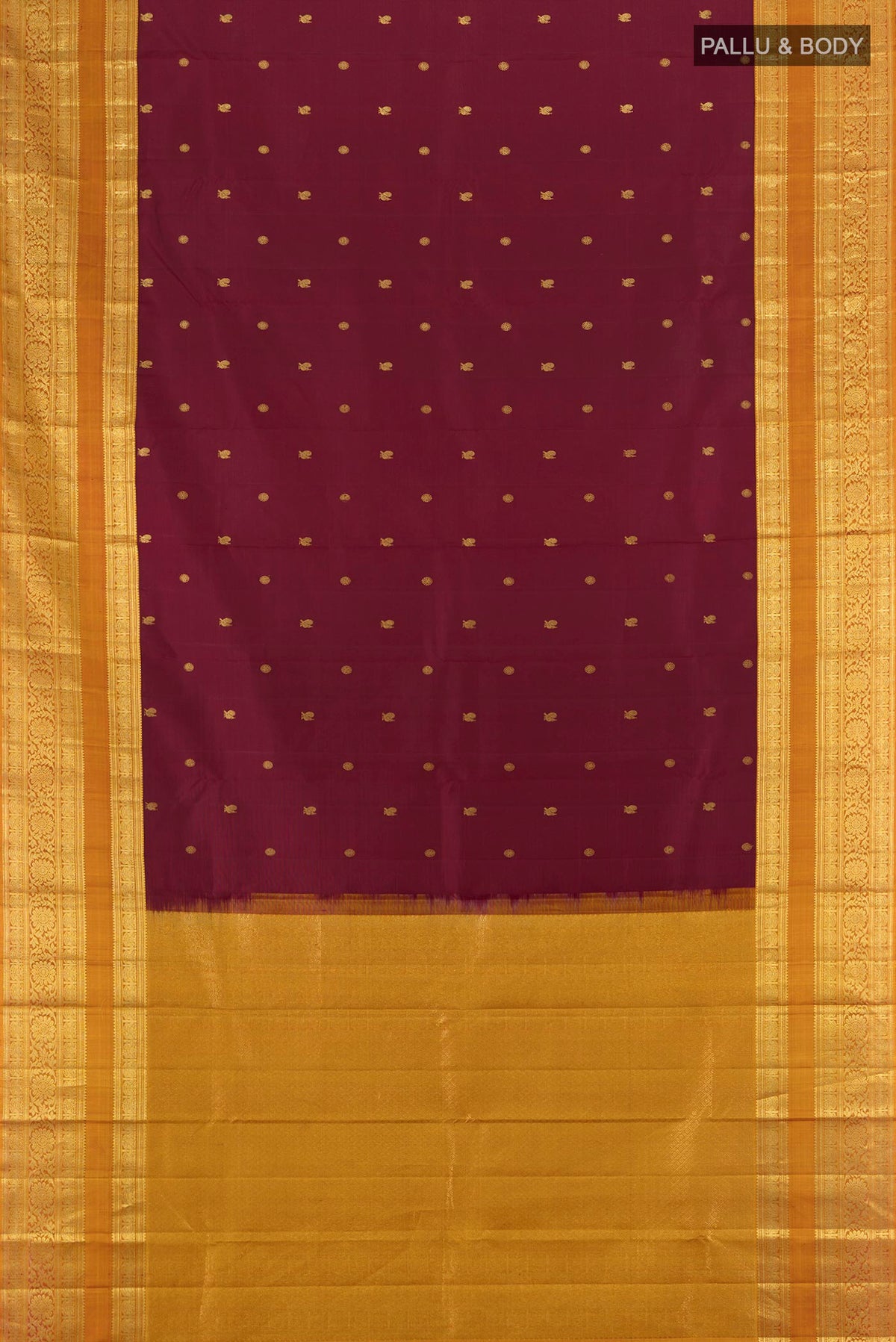 Flat view of Maroon Kanchipuram Silk Saree with Zari Butta on the body and Zari Border. 