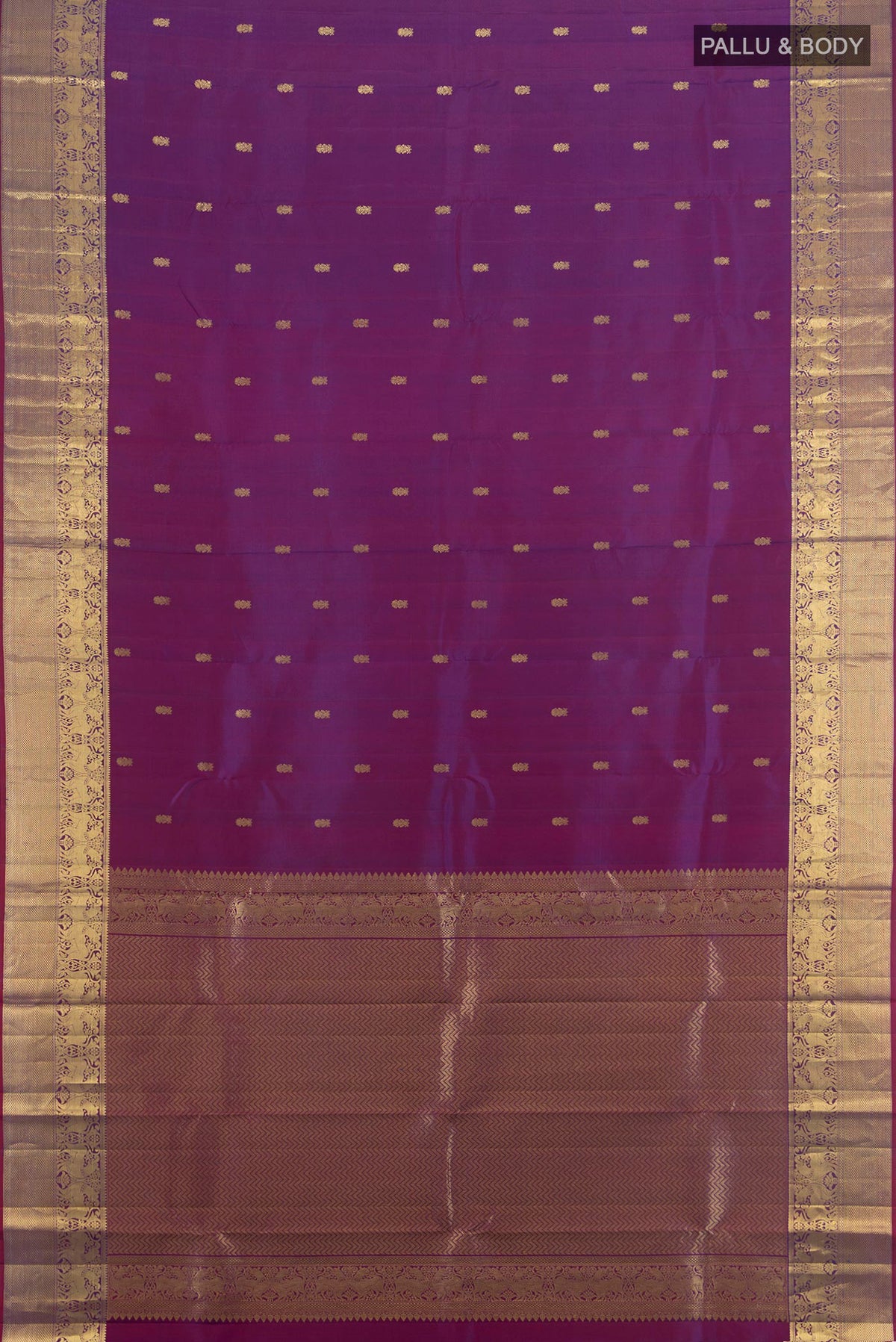 Flat view of Pure Silk Violet Kanchipuram Saree with Zari Butta on the body and Silk Border. 
