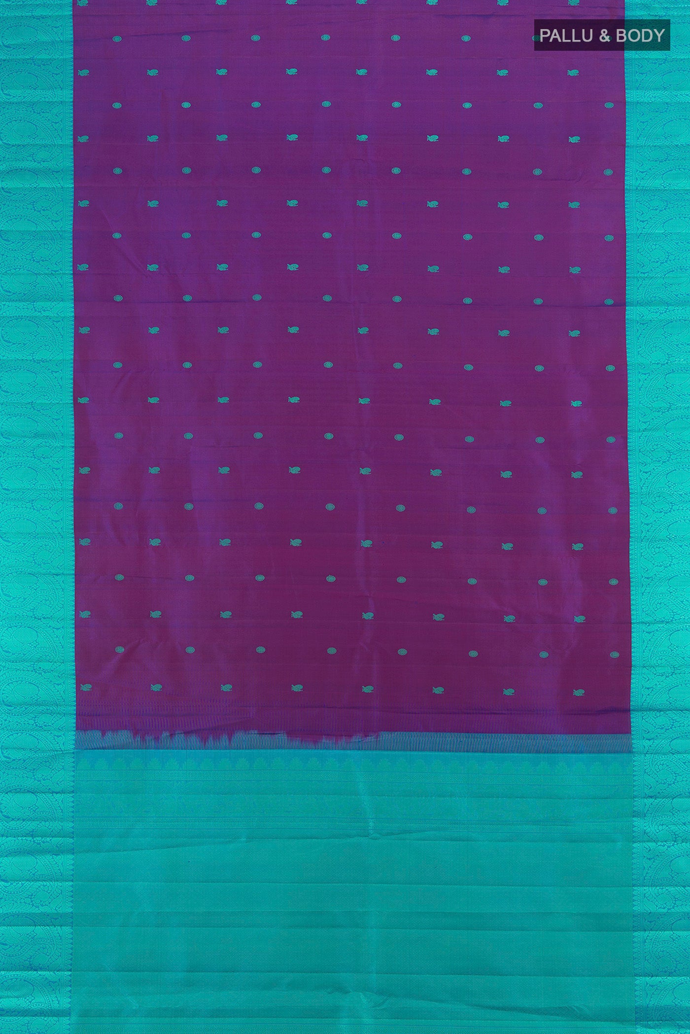 Flat view of Magenta Kanchipuram Silk Saree with Zari Butta on the body and Silk Border. 