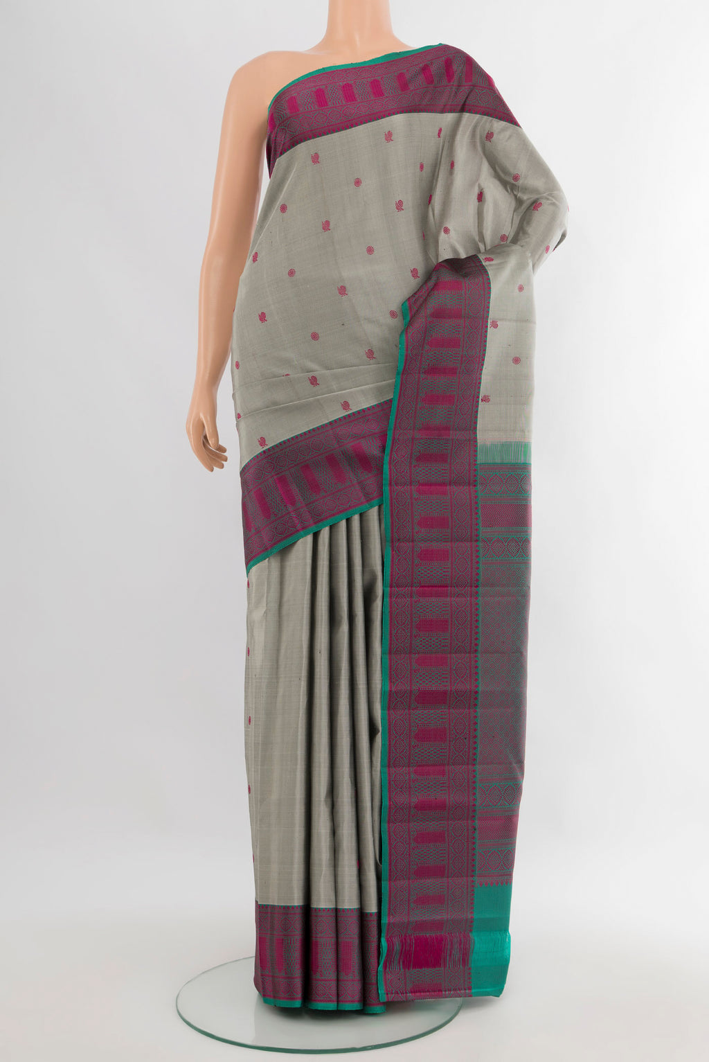 Davys Grey Kanchipuram Silk Saree with Thread Butta on the body and Thread Border.  displayed on a mannequin