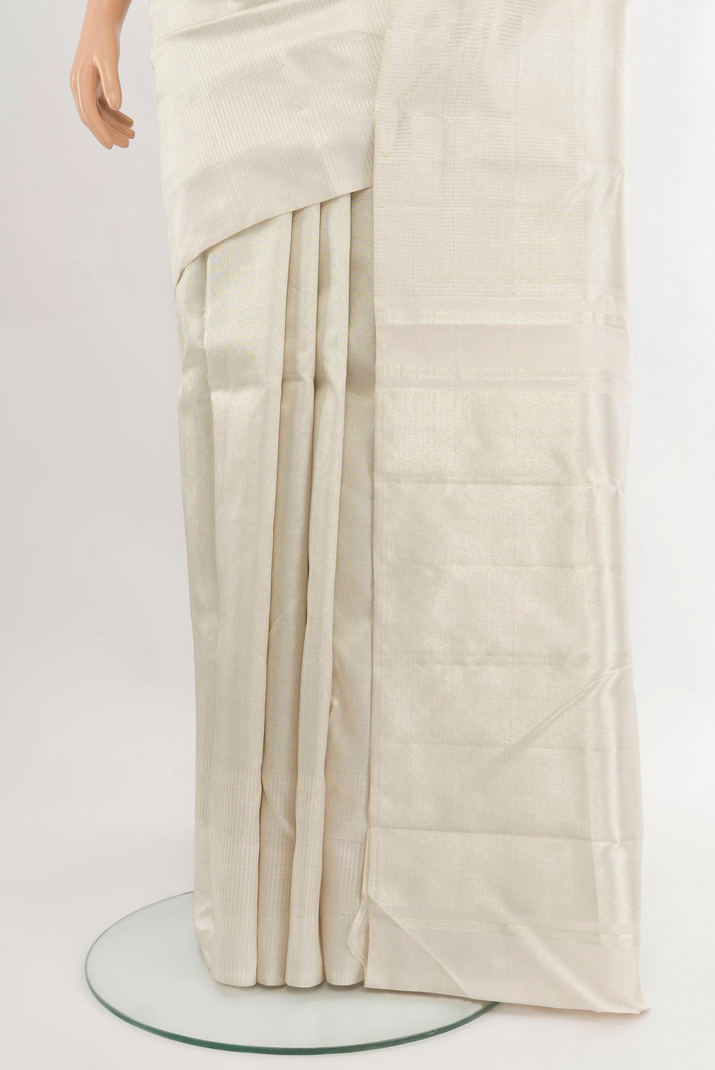 Pleats and pallu of Off White Kanchipuram Silk Saree with Zari Brocade on the body and Without Border. 
