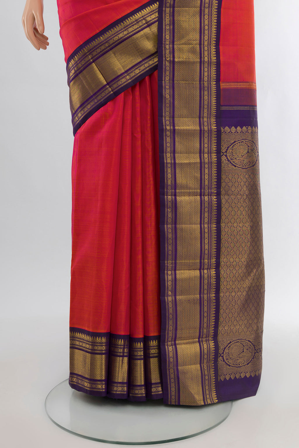 Pleats and pallu of Pure Silk Pure Zari Peach Kanjivaram Saree with Plain Body and Silk Border. 