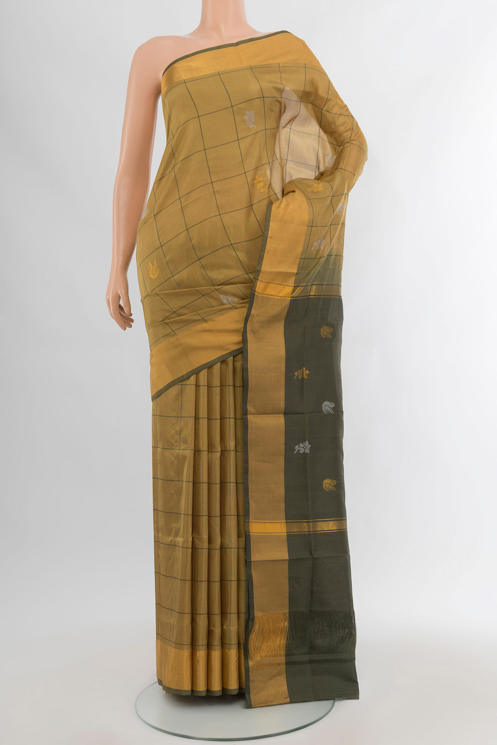 Beige Uppada Silk Saree with Checked design on the body and Silk Border.  displayed on a mannequin