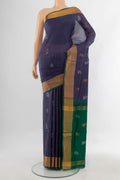 Pure Silk Navy Blue Uppada Saree with Zari Butta on the body and Zari Border.  displayed on a mannequin