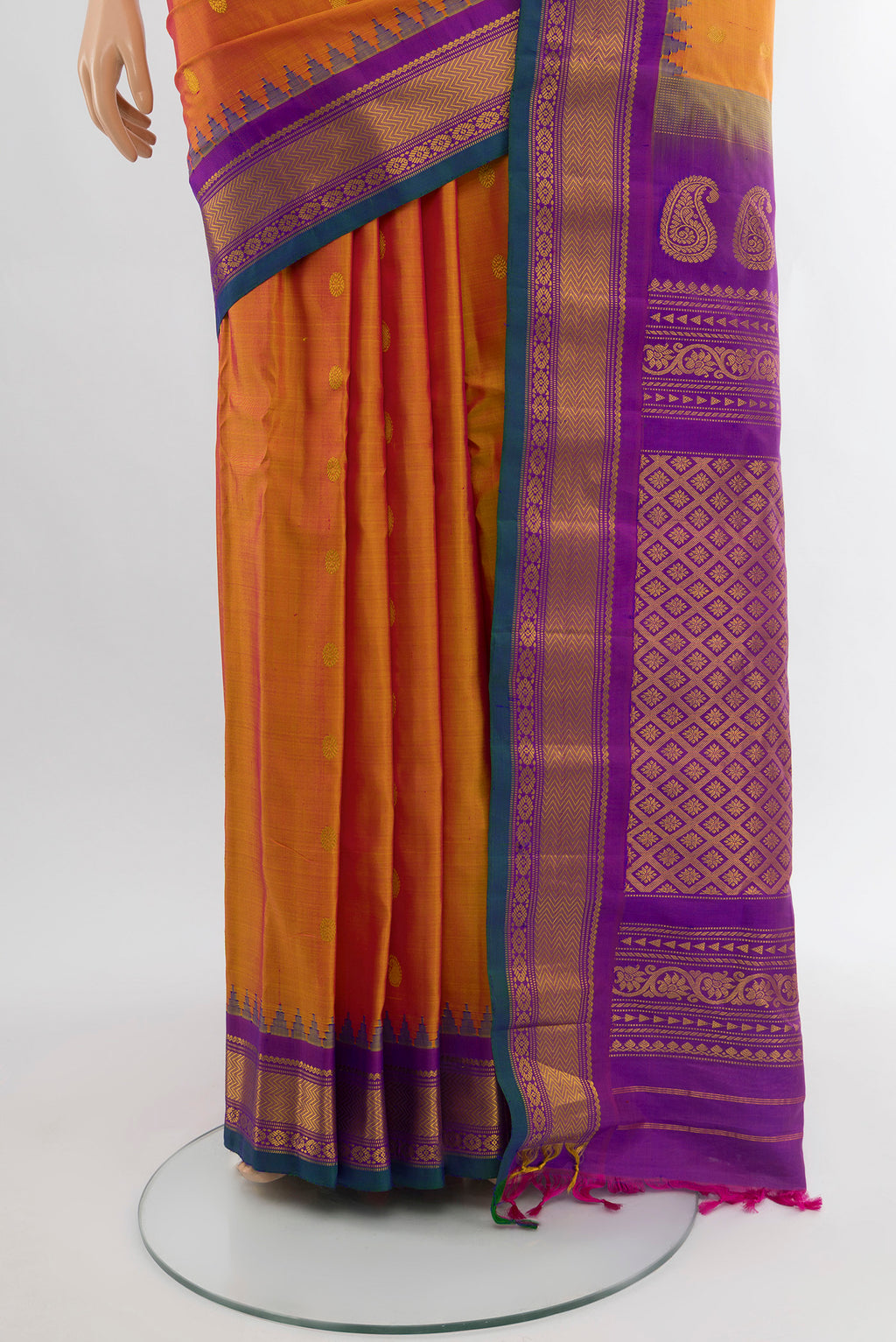 Pleats and pallu of Pure Silk Pure Zari Golden Peach Gadwal Saree with Zari Butta on the body and Silk Border. 