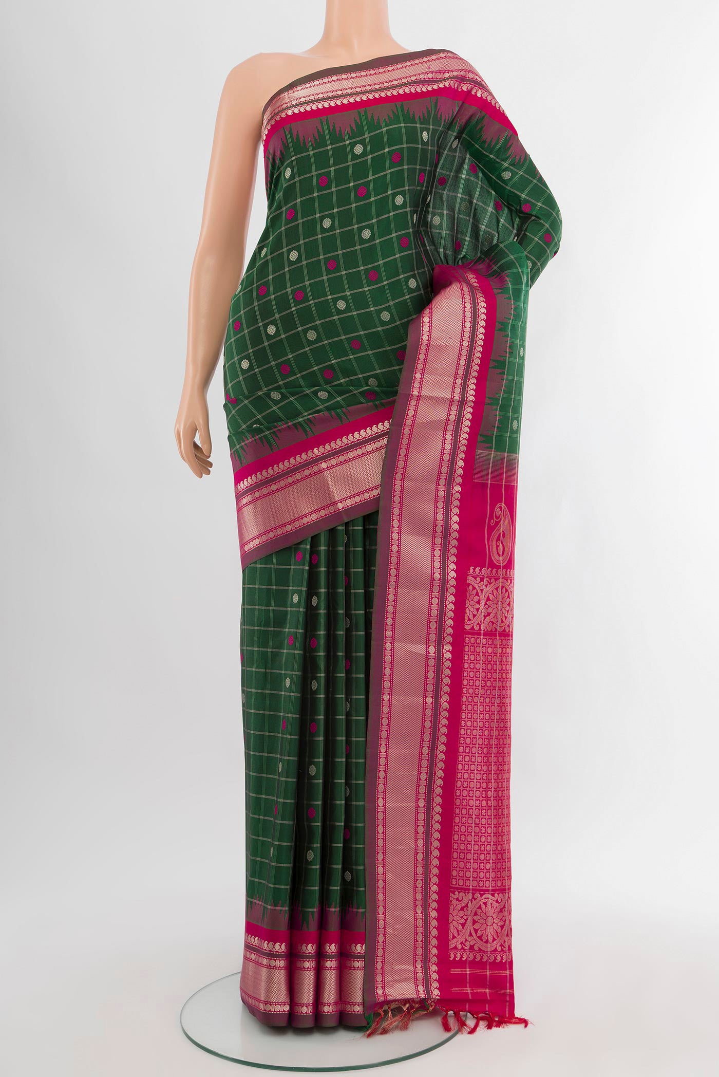Bottle Green Gadwal Silk Saree with Checked design on the body and Zari Border.  displayed on a mannequin
