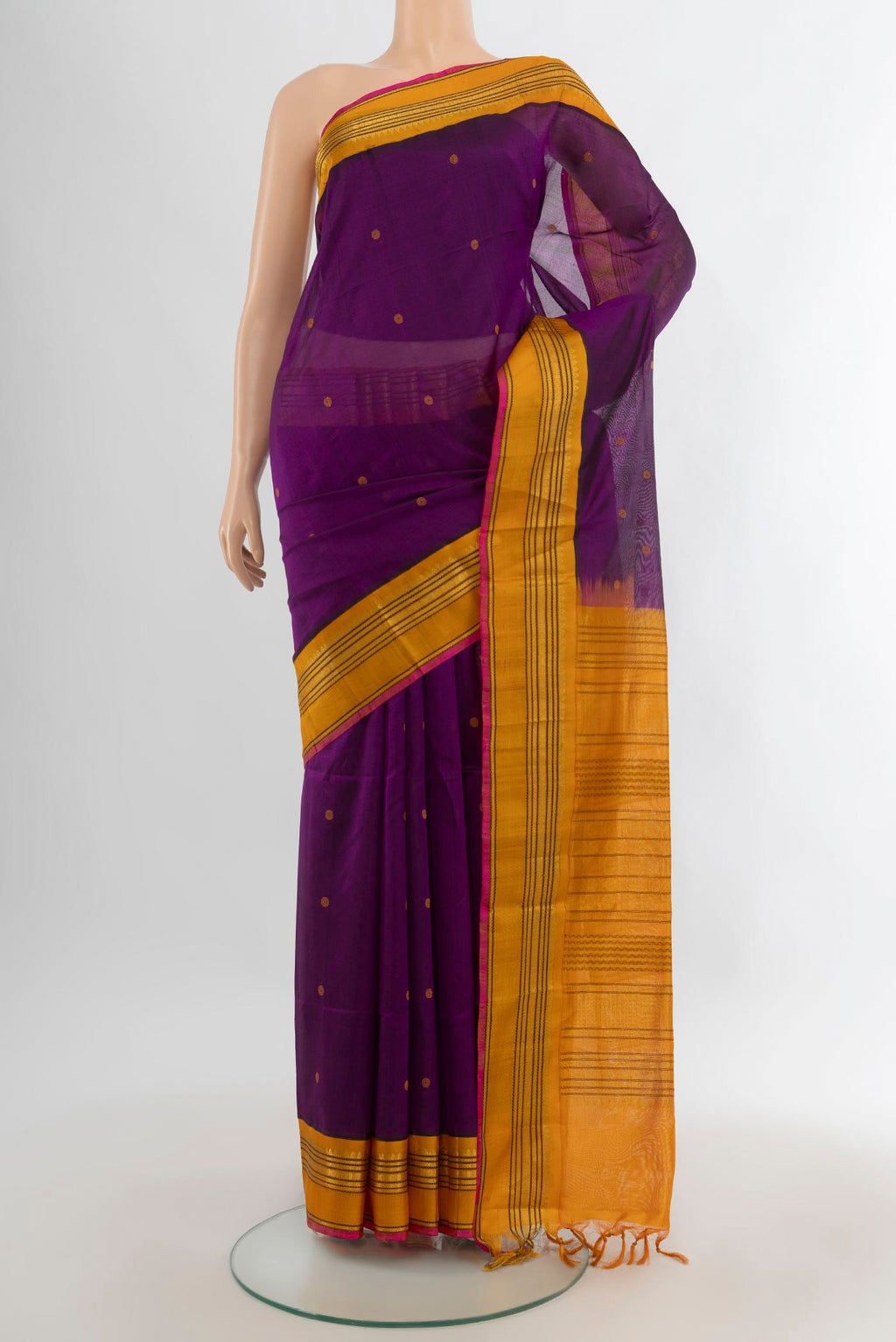 Purple Silk Cotton Saree with Thread Butta on the body and Zari Border.  displayed on a mannequin