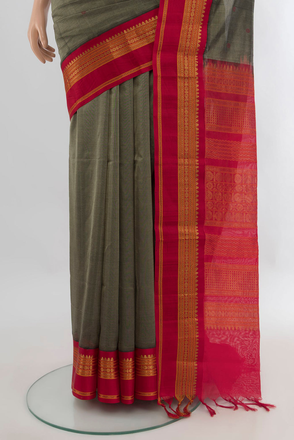 Pleats and pallu of Olive Green Silk Cotton Saree with Thread Butta on the body and Zari Border. 