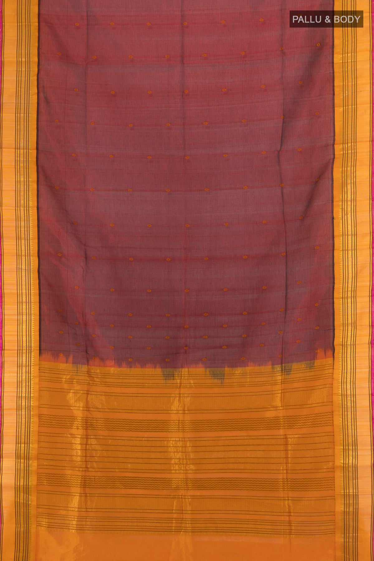Flat view of Maroon Silk Cotton Saree with Zari Butta on the body and Silk Border. 