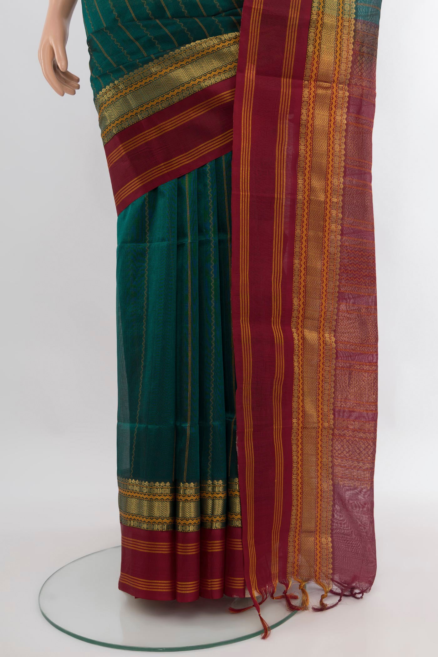 Pleats and pallu of Sea Green Silk Cotton Saree with Stripes on the body and Zari Border. 