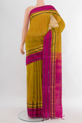 Mehandi Green Silk Cotton Saree with Stripes on the body and Zari Border.  displayed on a mannequin