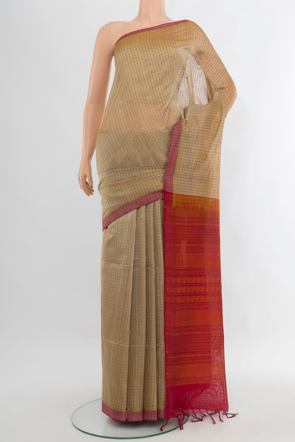Beige Silk Cotton Saree with Checked design on the body and Without Border.  displayed on a mannequin