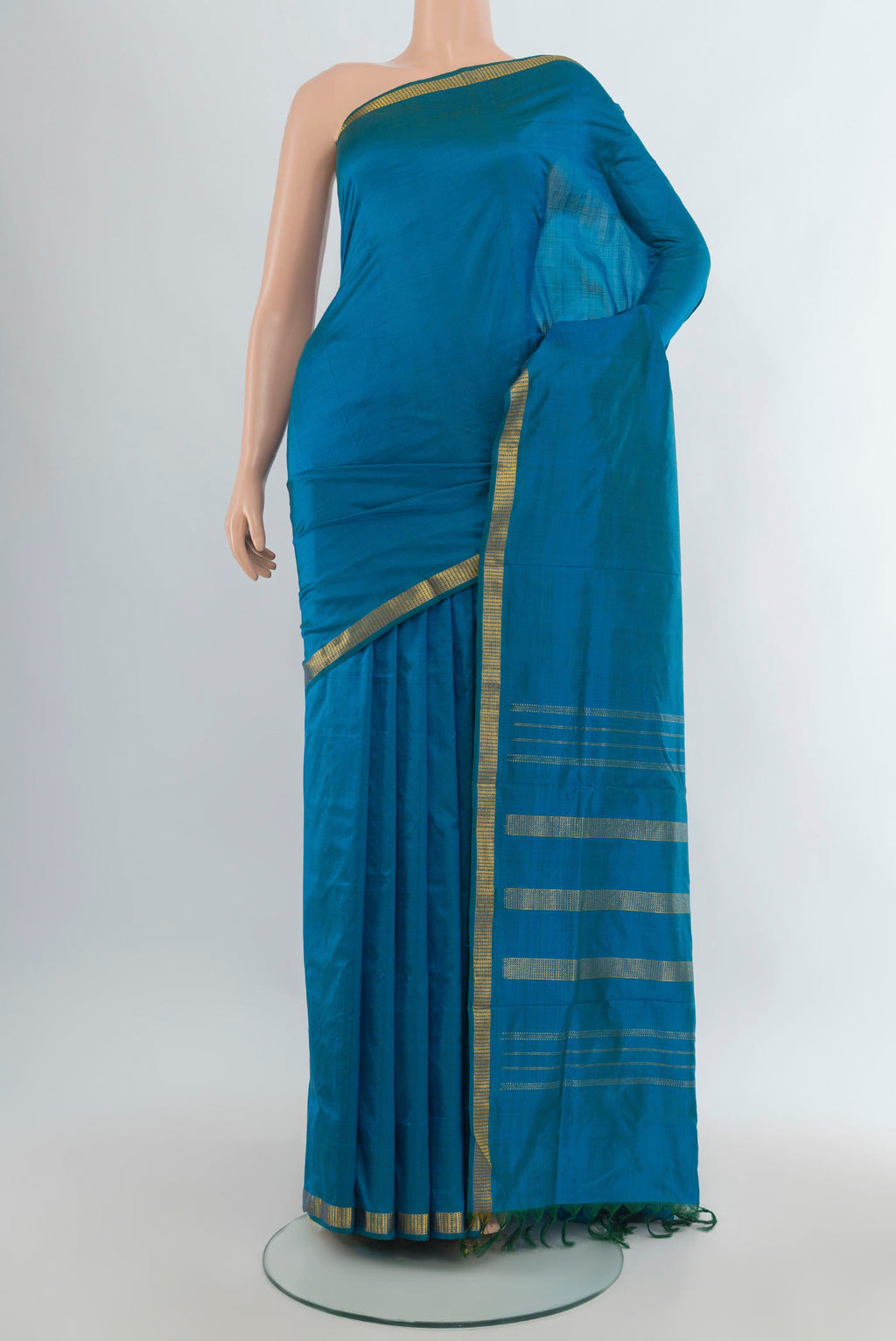 Pure Silk Blue Kanjivaram Nine Yards Saree with Plain Body and Zari Border.  displayed on a mannequin