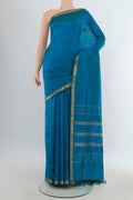 Pure Silk Blue Kanjivaram Nine Yards Saree with Plain Body and Zari Border.  displayed on a mannequin