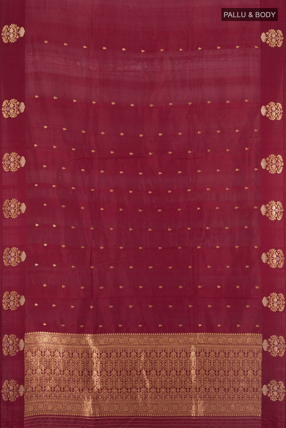 Flat view of Pure Silk Coffee Brown Banarasi Katan Saree with Zari Butta on the body and Plain Border. 