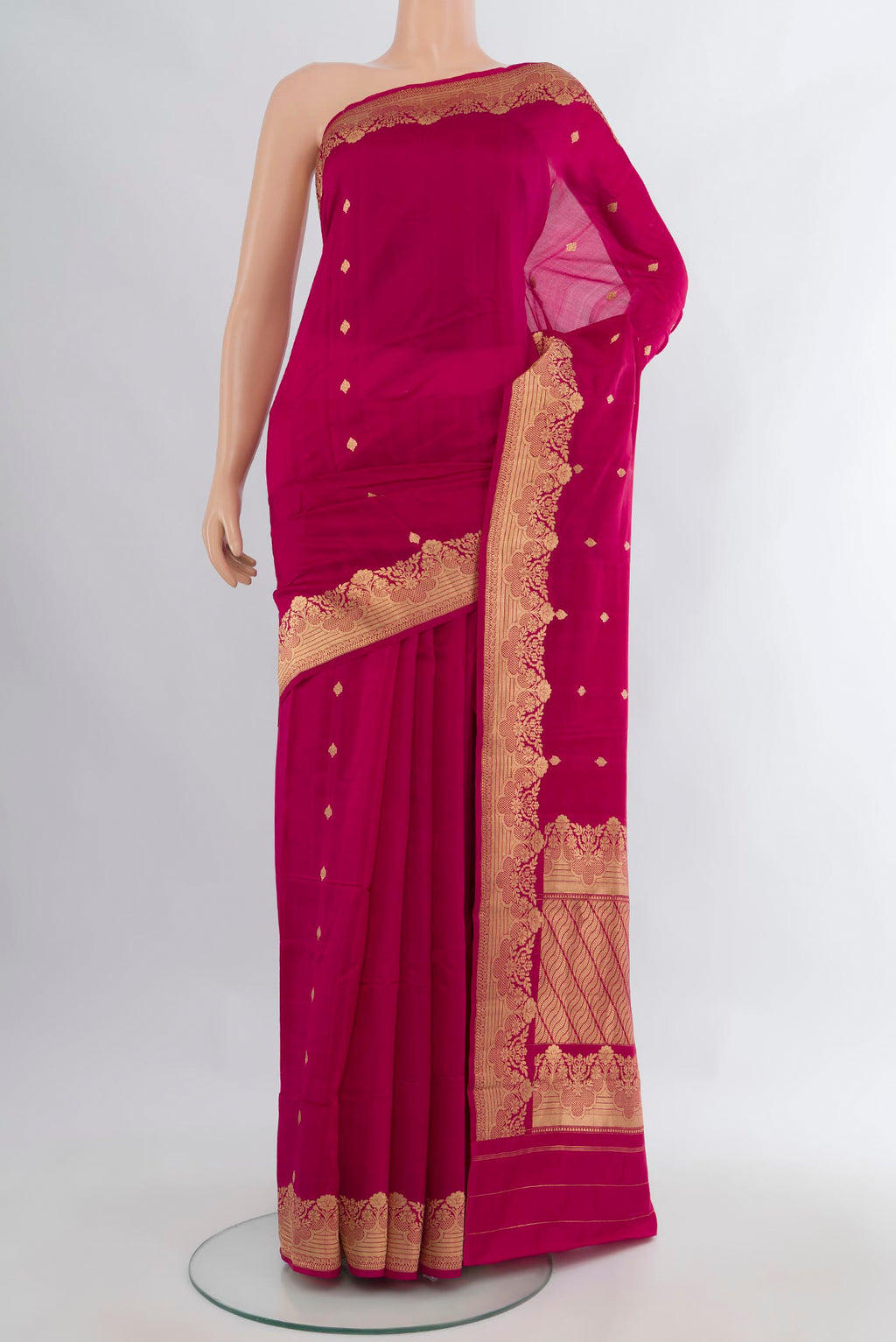 Pure Silk Dark Pink Banarasi Katan Saree with Zari Butta on the body and Plain Border.  displayed on a mannequin