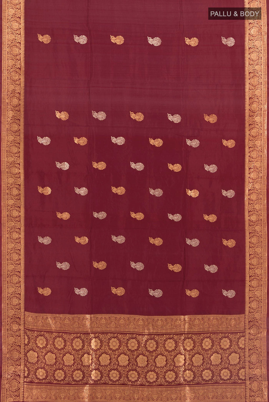 Flat view of Maroon Banarasi Katan Silk Saree with Zari Butta on the body and Zari Border. 