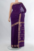 Pure Silk Violet Banarasi Katan Saree with Zari Butta on the body and Zari Border.  displayed on a mannequin