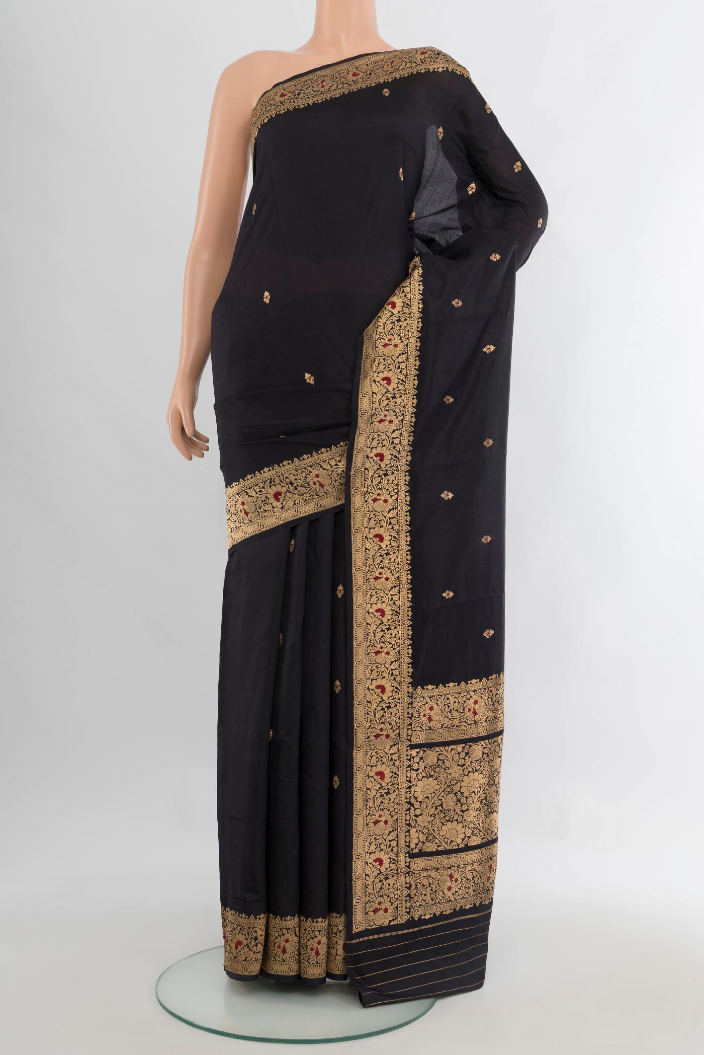 Pure Silk Black Banarasi Katan Saree with Zari Butta on the body and Zari Border.  displayed on a mannequin