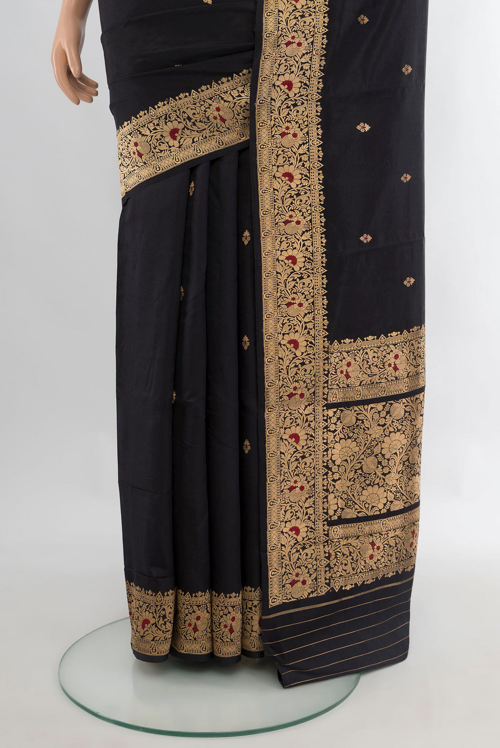 Pleats and pallu of Pure Silk Black Banarasi Katan Saree with Zari Butta on the body and Zari Border. 