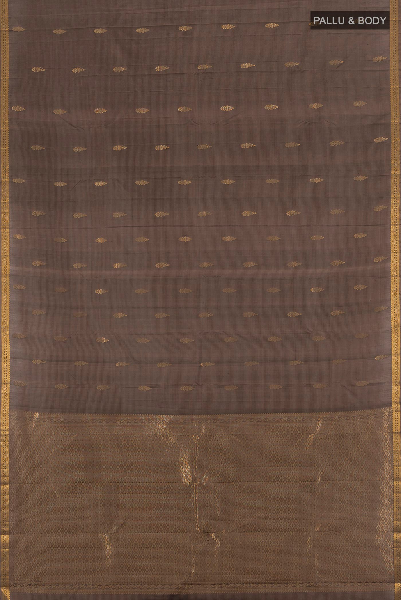 Flat view of Brown Kanjivaram Silk Saree with Zari Butta on the body and Zari Border. 