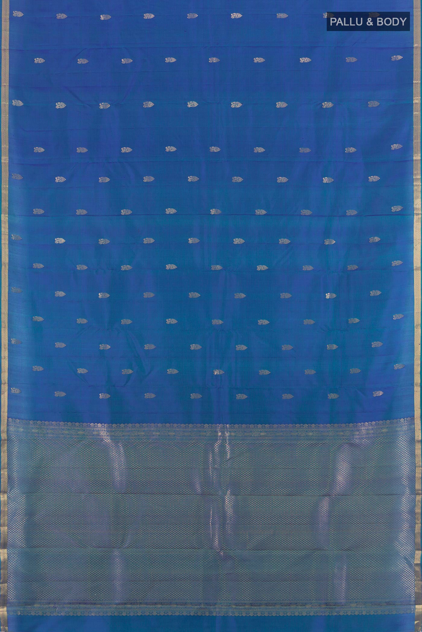 Flat view of Peacock Blue Kanjivaram Silk Saree with Zari Butta on the body and Zari Border. 