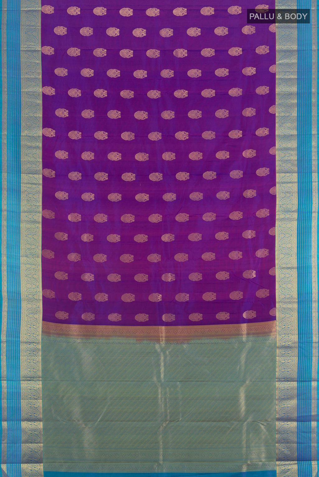 Flat view of Purple Kanchipuram Silk Saree with Zari Butta on the body and Zari Border. 