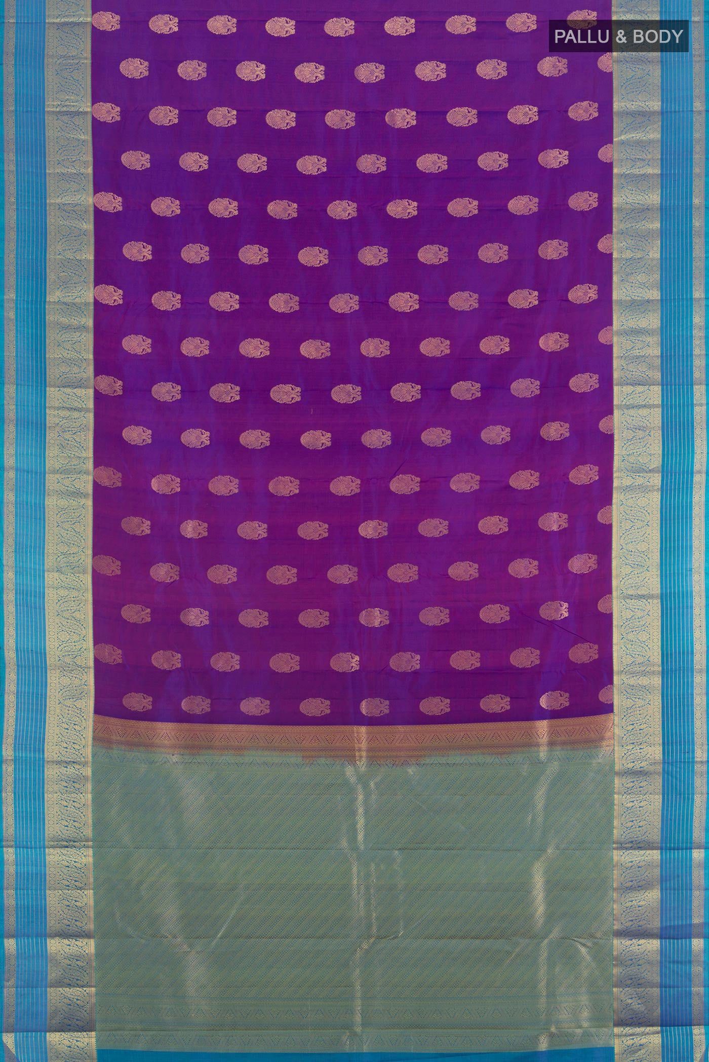 Flat view of Purple Kanchipuram Silk Saree with Zari Butta on the body and Zari Border. 