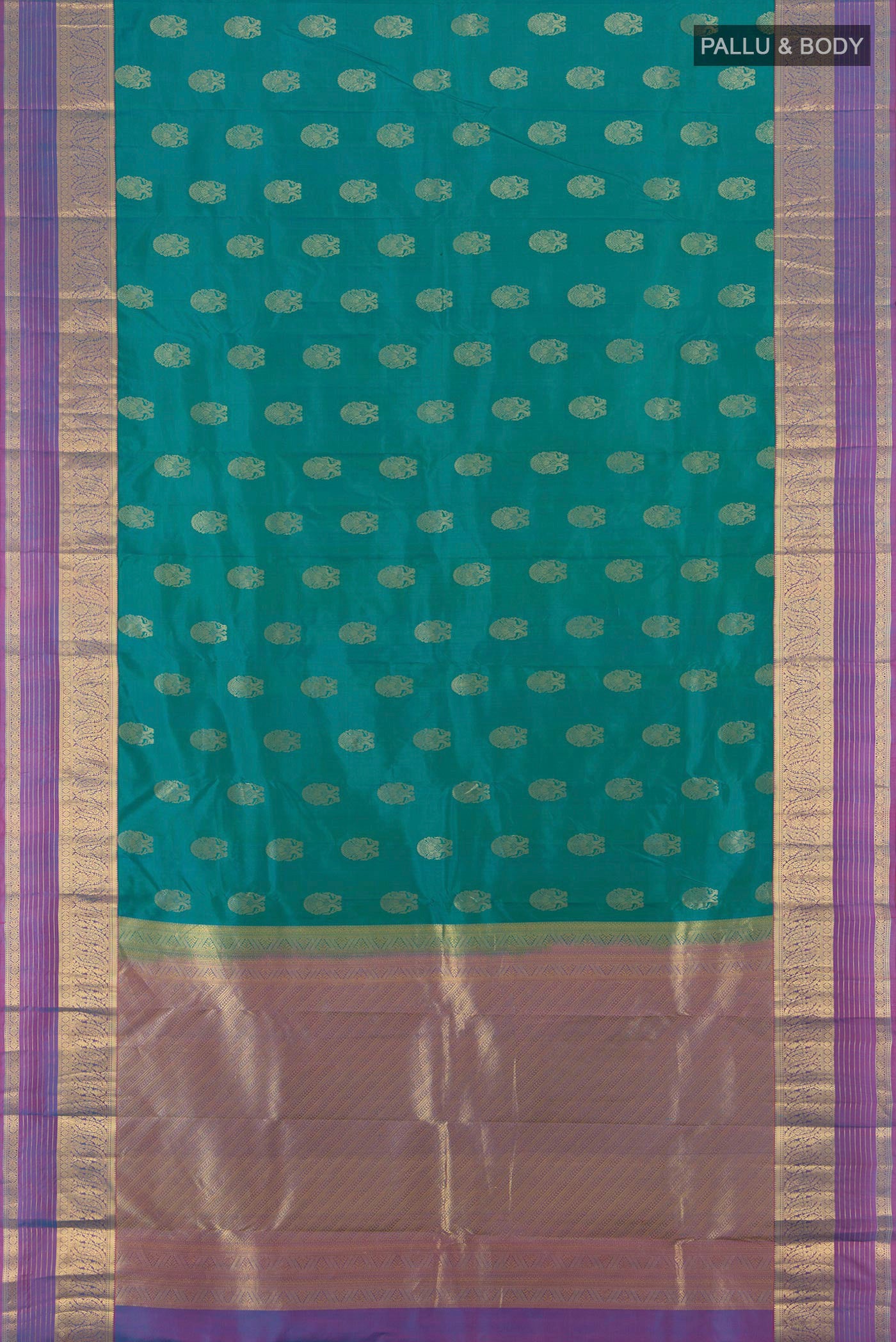 Flat view of Peacock Blue Kanchipuram Silk Saree with Zari Butta on the body and Zari Border. 