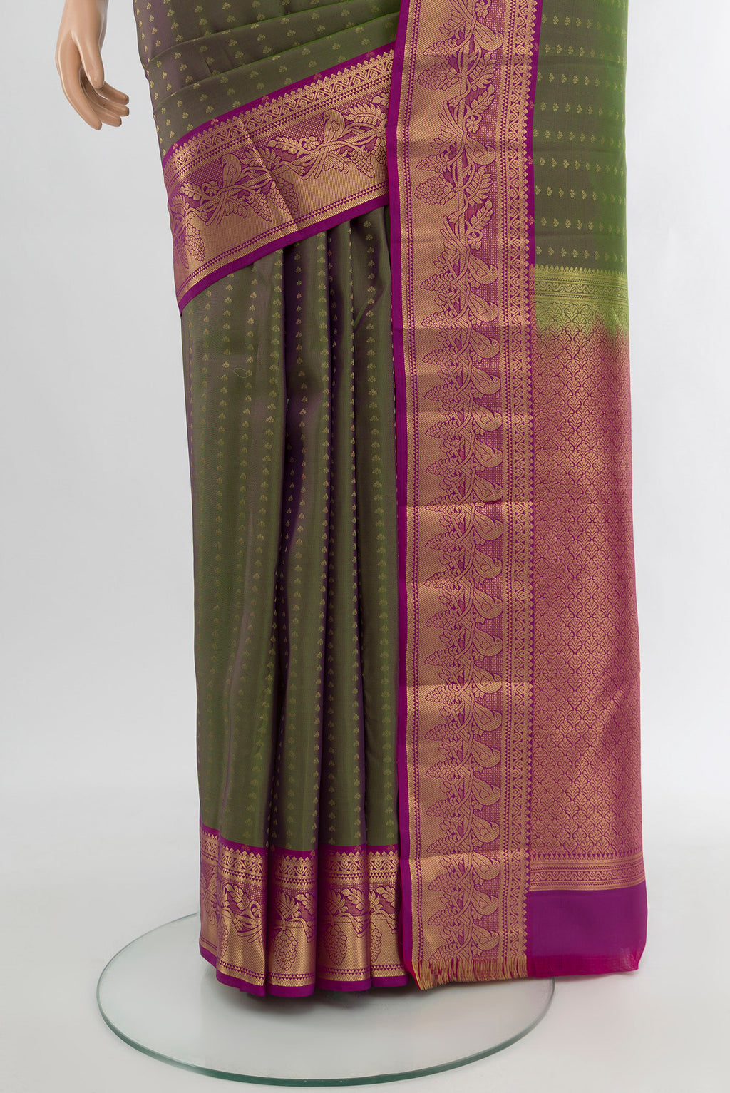 Pleats and pallu of Multi Color Kanchipuram Silk Saree with Zari Butta on the body and Zari Border. 