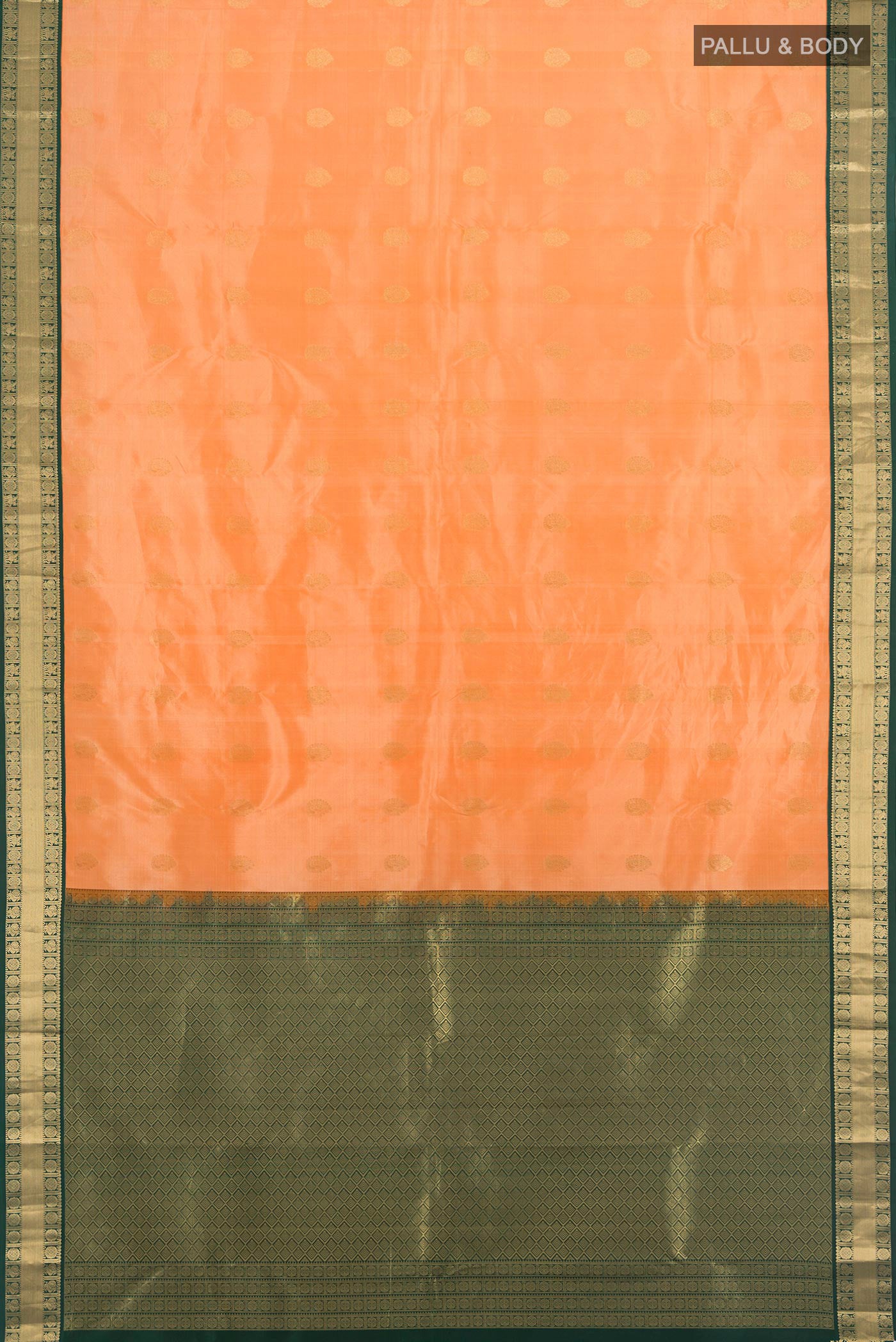 Flat view of Peach Kanchipuram Silk Saree with Zari Butta on the body and Zari Border. 