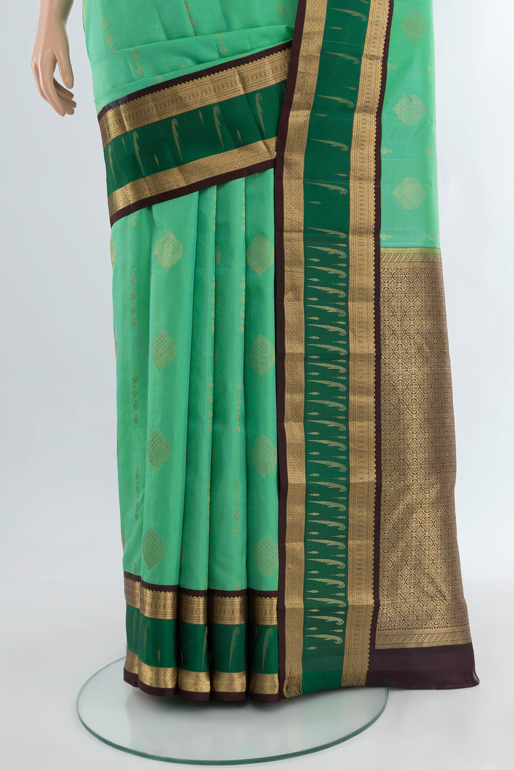 Pleats and pallu of Sea Green Kanjivaram Silk Saree with Zari Butta on the body and Zari Border. 